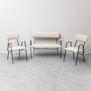 Vintage living room with sofa and armchairs in metal and fabric from the 70s, modern antiques